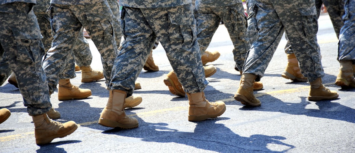 group of troops marching in boots