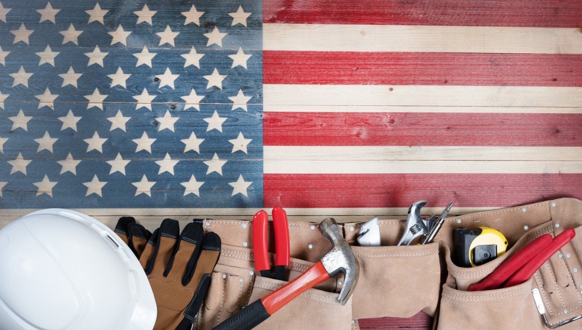 tools laying on wood painted like the american flag